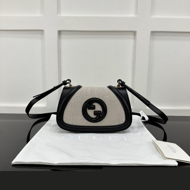 G*u*i satchel bags